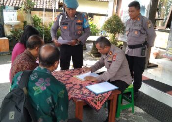Kapolsek Gianyar Tanda Tangani MoU Dengan Kepala Sekolah Dasar