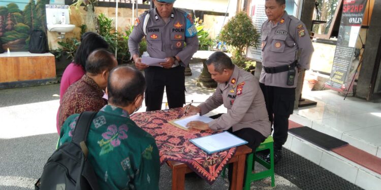 Kapolsek Gianyar Tanda Tangani MoU Dengan Kepala Sekolah Dasar