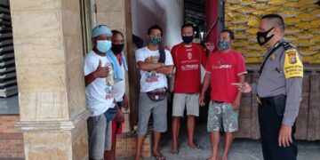 Jalin Sinergitas, Bhabinkamtibmas Bungaya Kangin Sambangi Buruh Pengangkut Beras