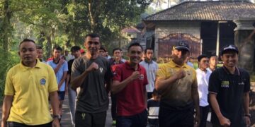 Menjalin Silaturrahmi, Bhabinkamtibmas Polsek Abang Hadiri Hut Desa