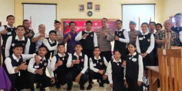 Jalin Hubungan Harmonis, Kapolsek Kubu Hadiri Giat Uji Kompetensi Keahlian Siswa SMK Negeri 1 Kubu