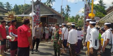 Sinergitas TNI – Polri dan Pecalang Dalam Melaksanakan Pengamanan Kegiatan Adat Pura Dalem Kupa Desa Nongan