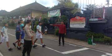 Pengaturan Lalu Lintas Atensi Kegiatan Masyarakat dan Anak Sekolah