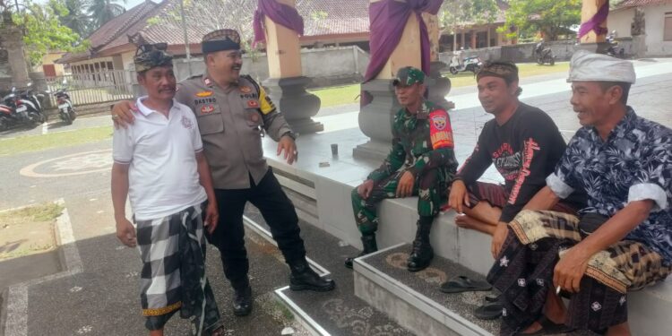 Jelang Pemilu 2024, Bhabinkamtibmas dan Babinsa Sambangi Warga Ingatkan Tak Mudah Percaya Berita Hoax